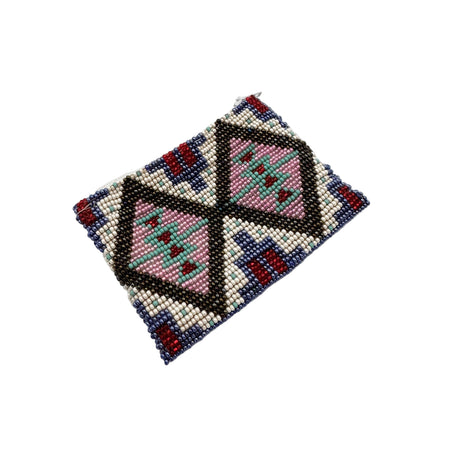 Beaded square with geometric pattern on a light gray background