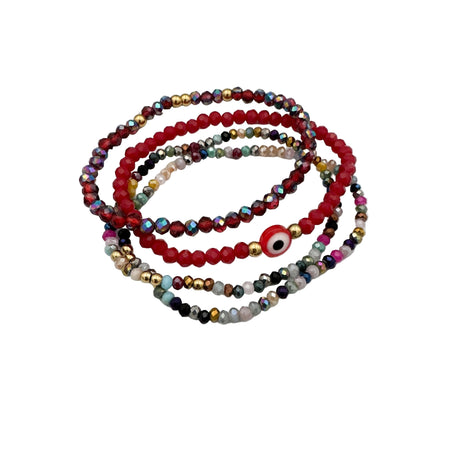 Set of colorful beaded bracelets on a white background