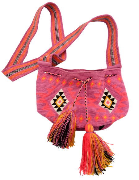 Colorful handbag with tassels on a white background